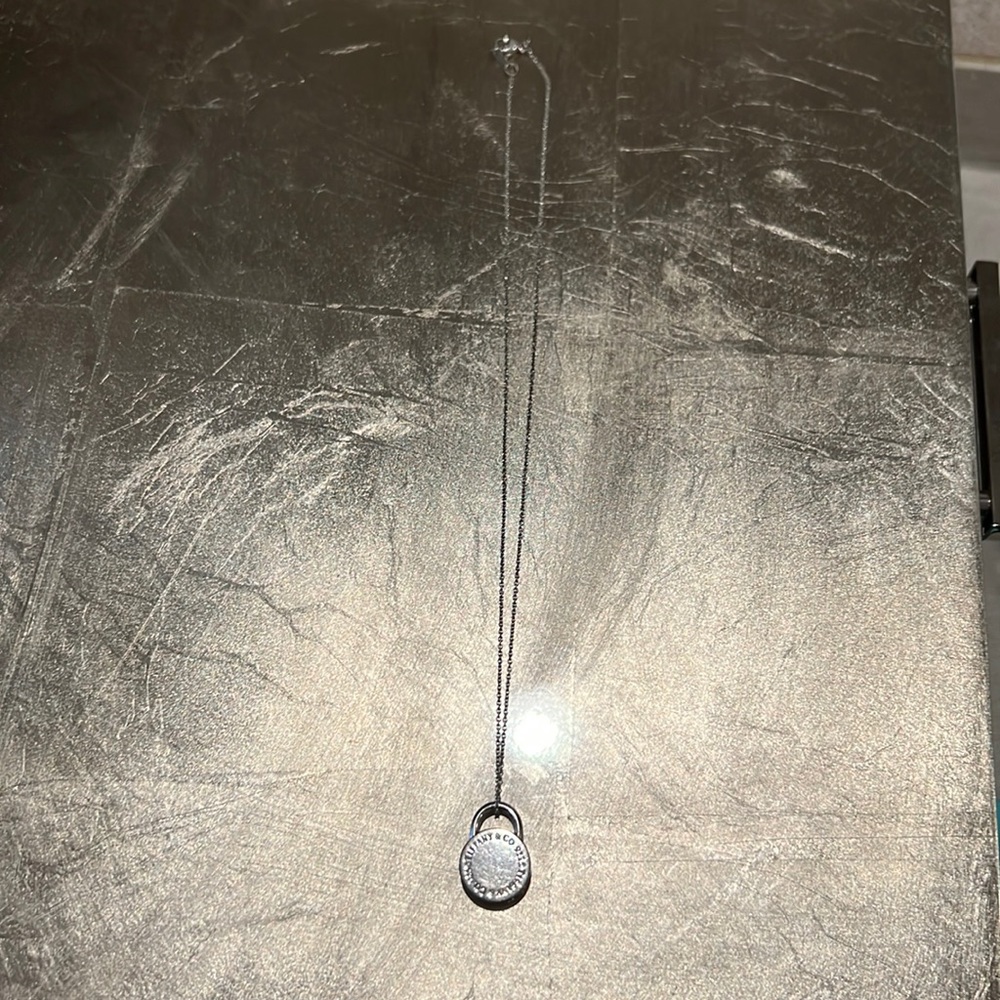 Tiffany & Co. silver lock necklace and dust bag